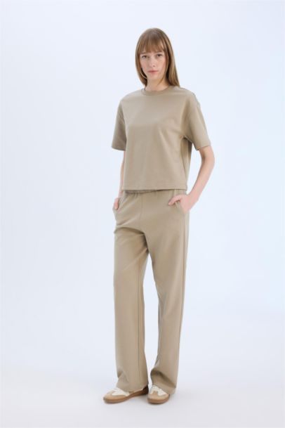 بنطلون بجامة رياضي سادة برجل واسع وجيب