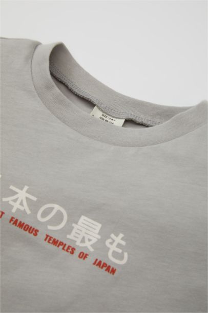 تيشيرت بيبي اولادي نص كم رمادي قصة عادية