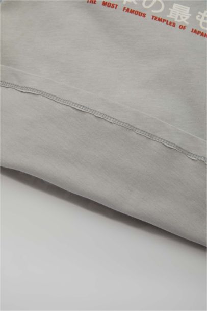 تيشيرت بيبي اولادي نص كم رمادي قصة عادية