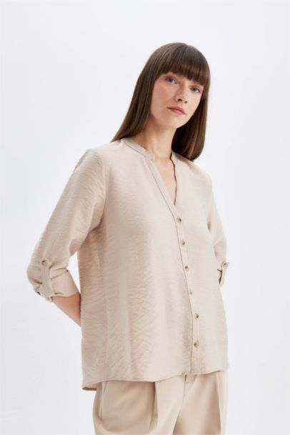 قميص ردن طويل قصة عادية بياخة مستديرة