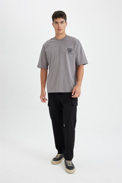 %100 Pamuk Oversize Geniş Kalıp Bisiklet Yaka Sırt Baskılı Kısa Kollu Tişört