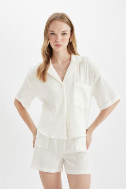 قميص بولو نص ردن موسلين قصة عادية