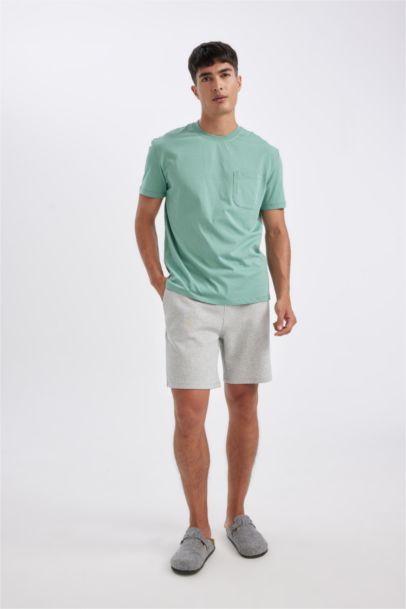 بلوزة بيجاما قصة عادية برقبة مستديرة بجيب