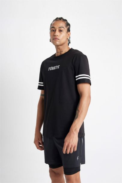 تيشيرت رياضي نص ردن قصة عادية بطبعة تركيا من DeFactoFit