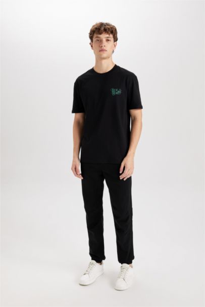 تيشيرت قطن نص كم قصة عادية برقبة مستديرة من ريك ومورتي