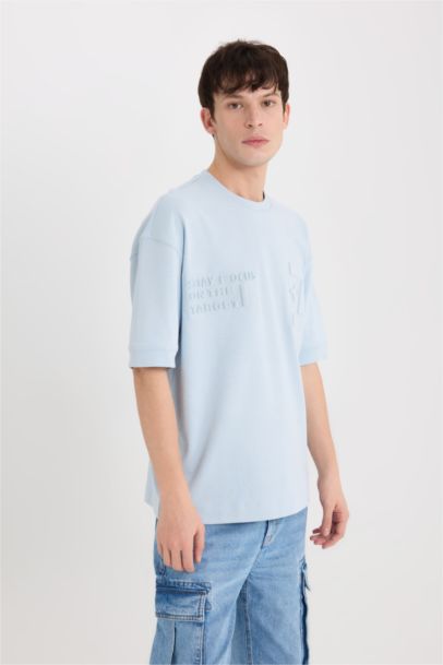 تيشيرت نص ردن مطبوع قصة فضفاضة بياخة مستديرة