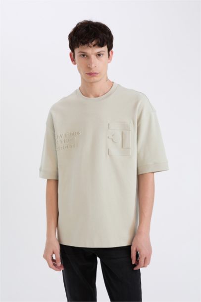 تيشيرت نص كم قصة فضفاضة برقبة مستديرة