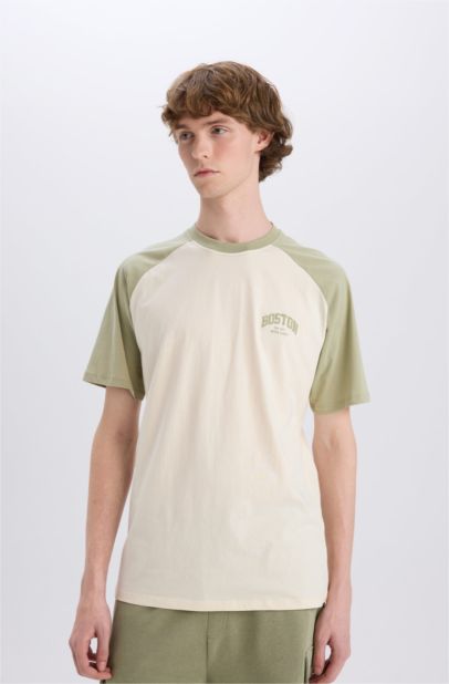 تيشيرت قطن اوفر سايز نص كم برقبة مستديرة مطبوع