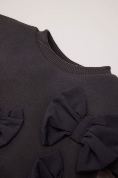 Sweatshirt à col rond avec nœuds pour bébé fille