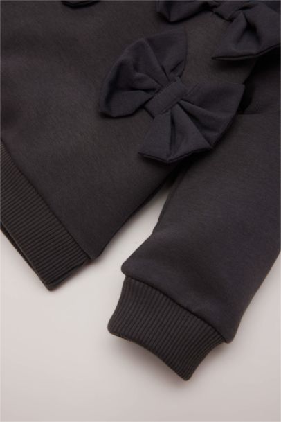 Sweatshirt à col rond avec nœuds pour bébé fille