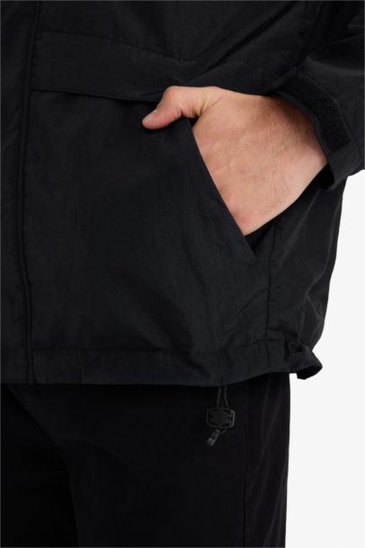 جاكيت مطر وتر بروف قصة عادية بكابيشون