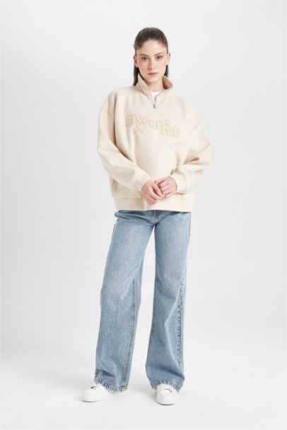 Sweat-shirt ample imprimé à demi-fermeture éclair à manches longues