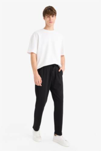 سروال رياضي واسع قصة مستقيمة بجيوب