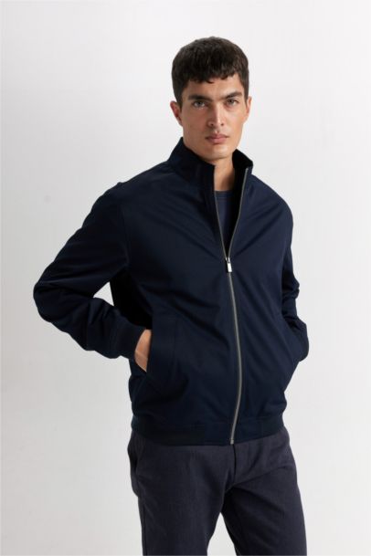 Veste slim zippée à col montant