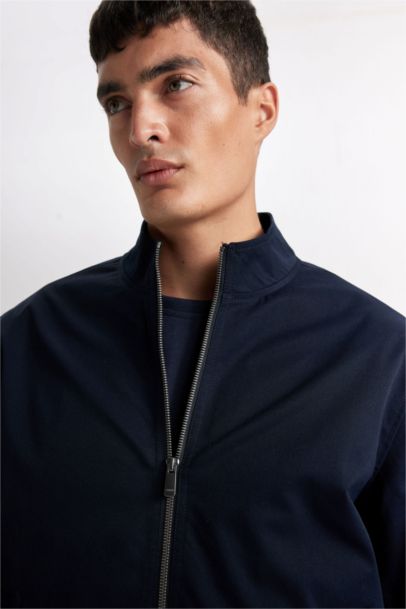 Veste slim zippée à col montant