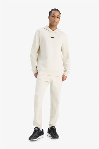 بنطلون بجامة رياضي جوجر قماش سكوبا قصة عادية من DeFactoFit