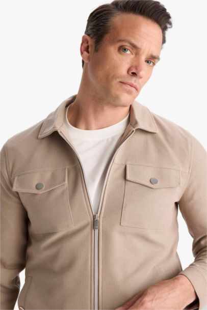 Veste slim à col polo et fermeture zip