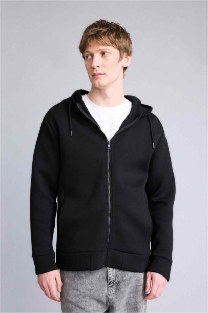 جاكيت رياضي قصة مريحة بغطاء للرأس وبطانة ناعمة