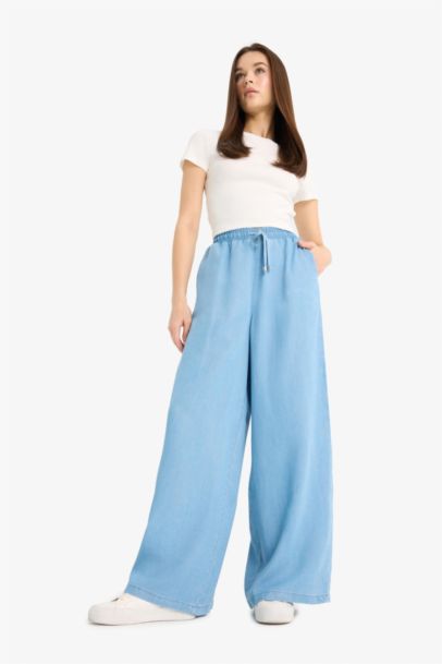 Pantalon long taille haute en Tencel délavé
