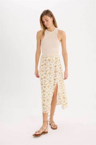 Миди юбка A-силуэта с цветочным узором и высокой талией