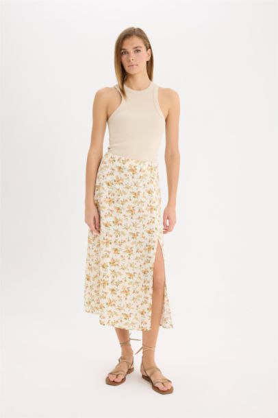 Миди юбка A-силуэта с цветочным узором и высокой талией