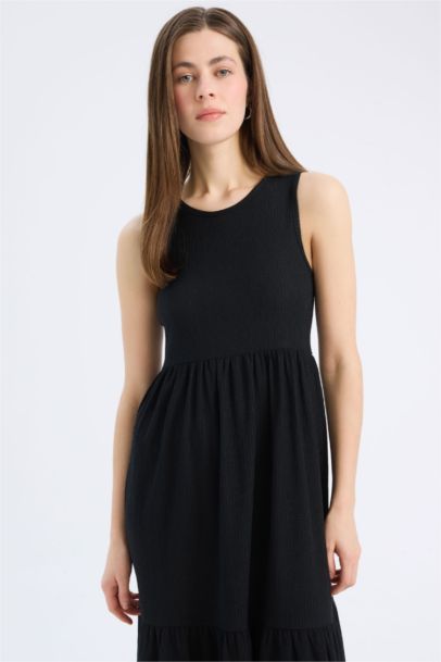 فستان ميدي كت منسوج بياخة مدورة