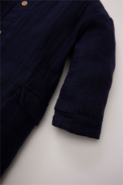 Combinaison en mousseline boutonnée pour bébé garçon