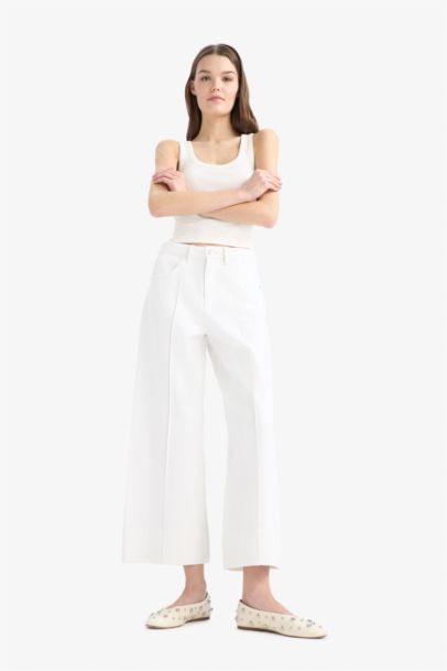 Jean blanc court taille haute à jambes larges