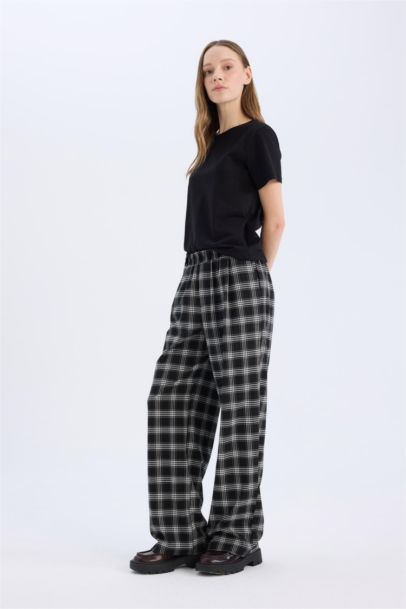 Pantalon pyjama large à carreaux avec poches et taille élastique