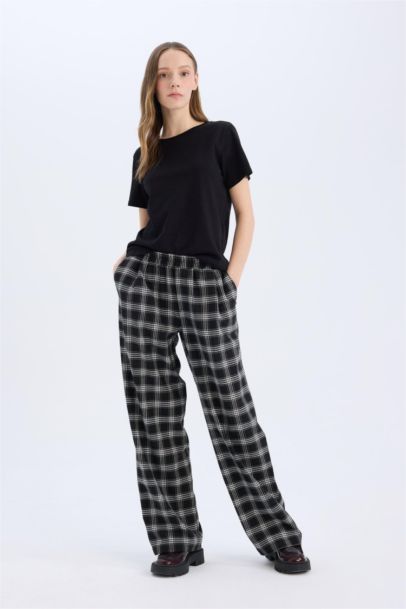 Pantalon pyjama large à carreaux avec poches et taille élastique