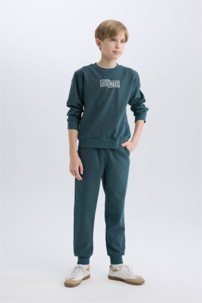 طقم اولادي تقيل سويت شيرت وسويت بانتس قصة عادية - قطعتين