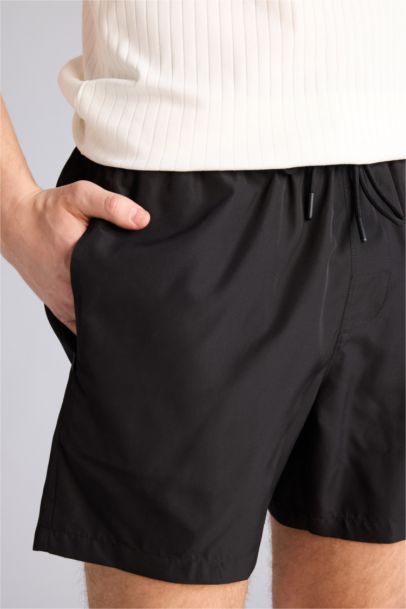 شورت بحر قصير ببطانة شبكية