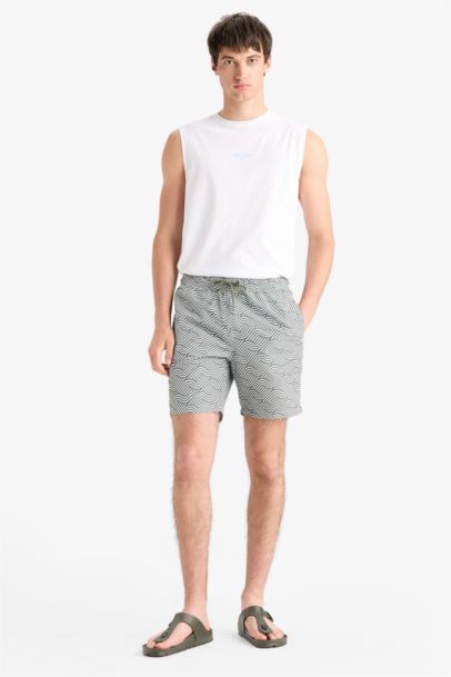 Short de bain au-dessus du genou imprimé avec doublure en filet