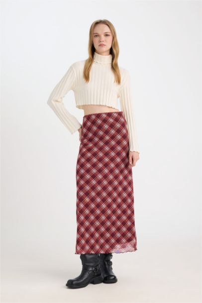 A Cut Patterned Normal Waist Tulle Maxi Skirt