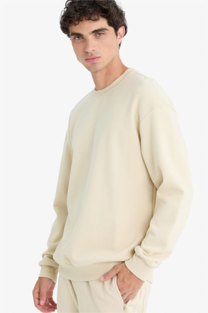 سويت شيرت أوفر سايز برقبة مستديرة