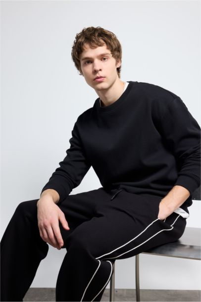 سويت شيرت اوفر سايز بيكيه برقبة مستديرة