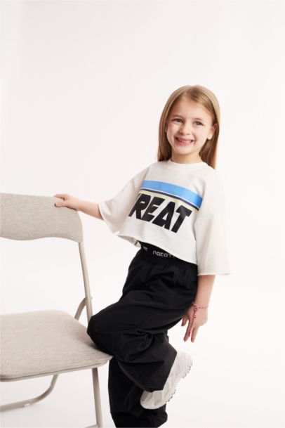 T-shirt à manches courtes Tissu Sweat Fin Slogan Col rond Fille