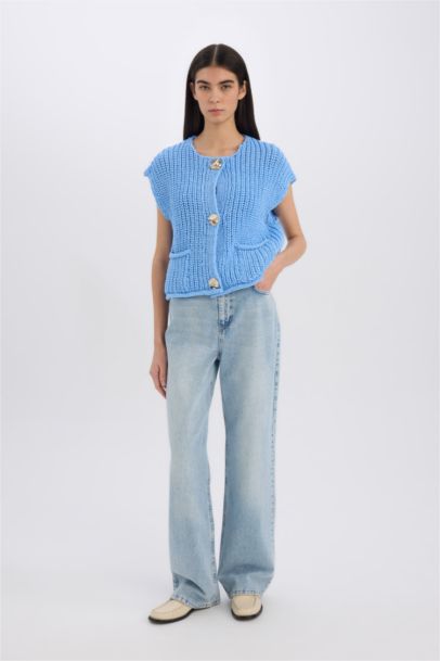 Pull en tricot sans manches décontracté boutonné avec poches