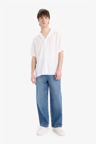 قميص صيفي نص ردن قصة عادية بياخة عالية