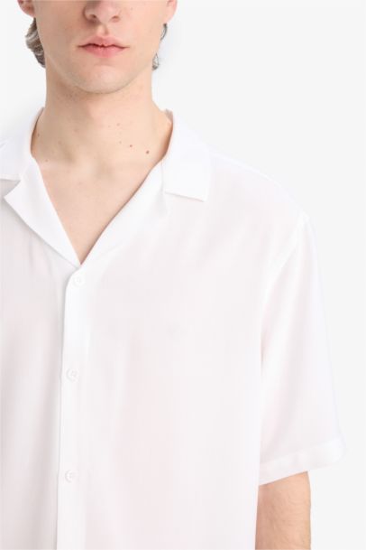 قميص صيفي نص ردن قصة عادية بياخة عالية