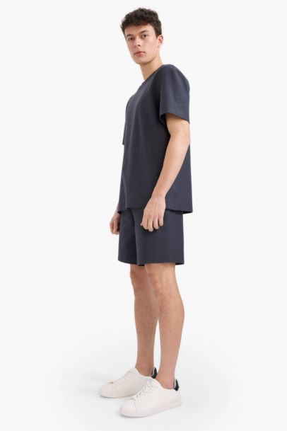 شورت قصة مريحة بجيوب