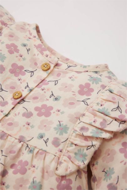 Chemise fleurie pour bébé fille