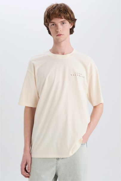 تيشيرت قطن أوفر سايز بطبعة من الخلف برقبة مستديرة