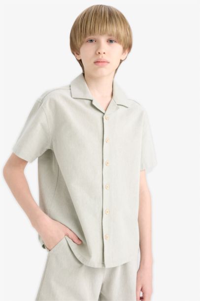 قميص بولو نص كم موسلين اوفر سايز