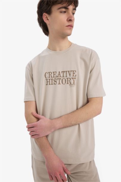 تيشيرت قطن قصة عادية برقبة مستديرة