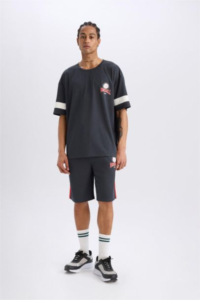 شورت قصة عادية مطبوع بجيب