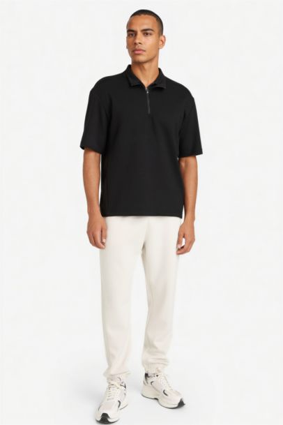 تيشيرت رياضي نص كم قماش سكوبا قصة عادية من DeFactoFit