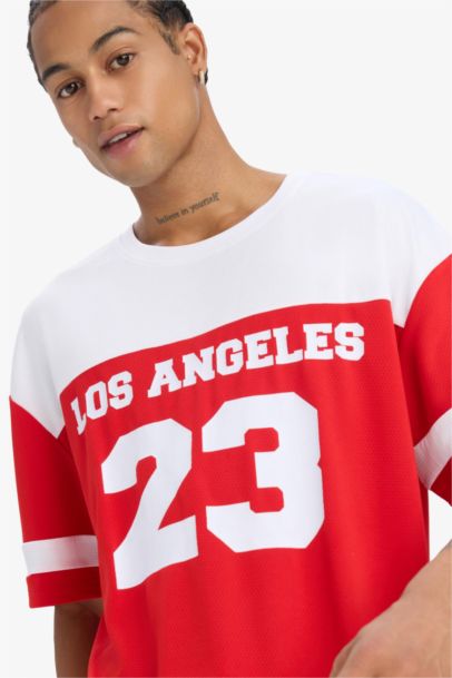 تيشيرت اوفر سايز مطبوع بياخة مستديرة