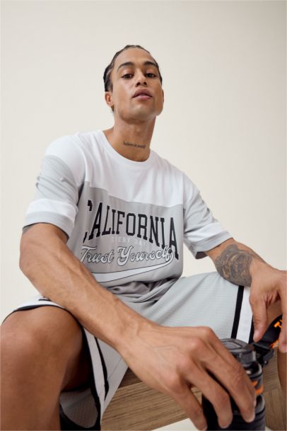 Hızlı Kuruyan Oversize Geniş Kalıp Bisiklet Yaka Baskılı Sporcu Kısa Kollu Tişört