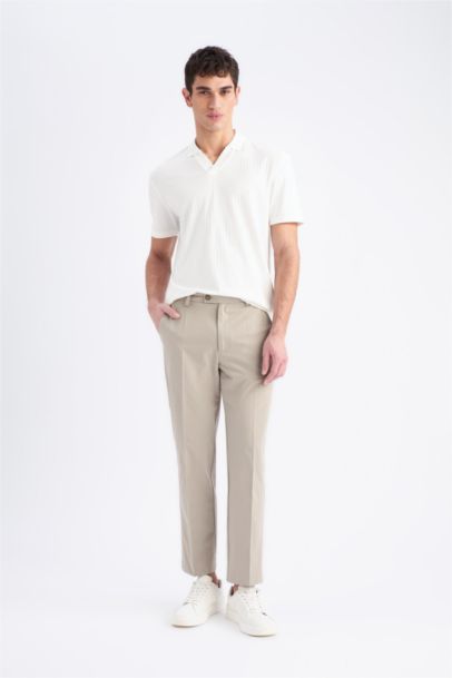 Брюки с посадкой джоггера и застежкой на молнию на манжетах